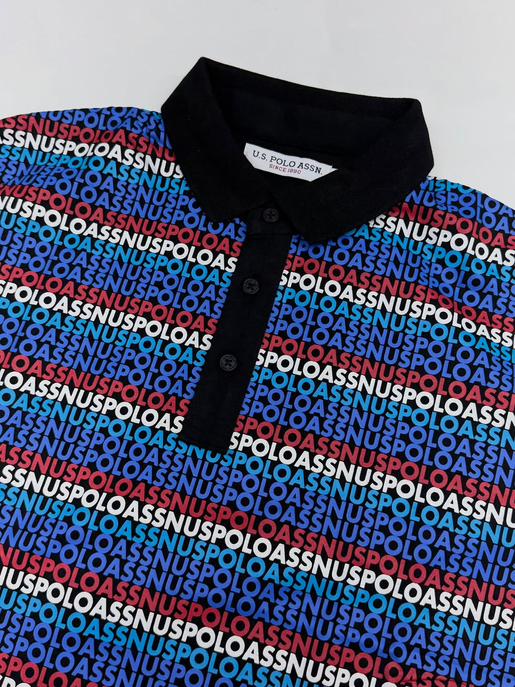 U.S. Polo Assn. Men’s All-Over Monogram Polo – Black & Royal Blue